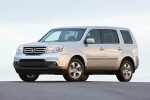 Picture of a 2014 Honda Pilot EX-L in Alabaster Silver Metallic from a front left three-quarter perspective