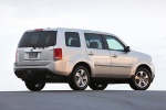 Picture of a 2014 Honda Pilot EX-L in Alabaster Silver Metallic from a rear right three-quarter perspective