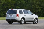Picture of a 2014 Honda Pilot EX-L in Alabaster Silver Metallic from a rear right perspective