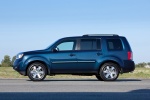Picture of a 2014 Honda Pilot Touring in Obsidian Blue Pearl from a side perspective
