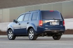 Picture of a 2014 Honda Pilot Touring in Obsidian Blue Pearl from a rear left perspective