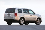 Picture of a 2015 Honda Pilot EX-L in Alabaster Silver Metallic from a rear right three-quarter perspective