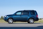 Picture of a 2015 Honda Pilot Touring in Obsidian Blue Pearl from a side perspective