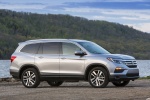 Picture of a 2016 Honda Pilot AWD in Lunar Silver Metallic from a front right three-quarter perspective
