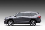 Picture of a 2016 Honda Pilot in Modern Steel Metallic from a side perspective