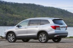 Picture of a 2016 Honda Pilot AWD in Lunar Silver Metallic from a rear left three-quarter perspective