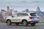 Picture of a 2017 Honda Pilot AWD in Lunar Silver Metallic from a rear left three-quarter perspective