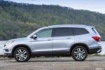 Picture of a 2017 Honda Pilot AWD in Lunar Silver Metallic from a side perspective