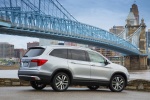 Picture of a 2018 Honda Pilot AWD in Lunar Silver Metallic from a rear right three-quarter perspective