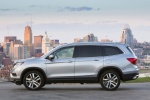 Picture of a 2018 Honda Pilot AWD in Lunar Silver Metallic from a side perspective