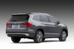 Picture of a 2018 Honda Pilot in Modern Steel Metallic from a rear right perspective