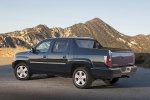 Picture of a 2013 Honda Ridgeline from a rear left three-quarter perspective