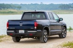 Picture of a 2017 Honda Ridgeline AWD in Obsidian Blue Pearl from a rear right perspective
