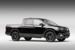 Picture of a 2017 Honda Ridgeline Black Edition AWD in Crystal Black Pearl from a front right three-quarter perspective