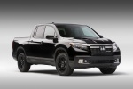 Picture of a 2017 Honda Ridgeline Black Edition AWD in Crystal Black Pearl from a front right perspective