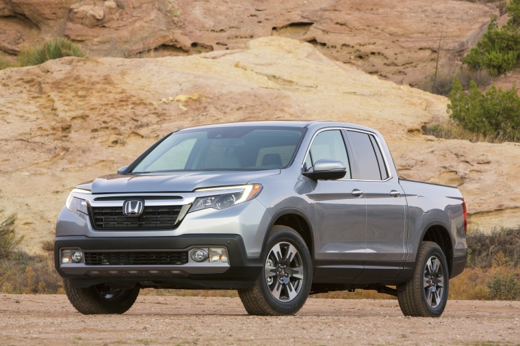 Picture of a 2018 Honda Ridgeline AWD in Lunar Silver Metallic from a front left perspective