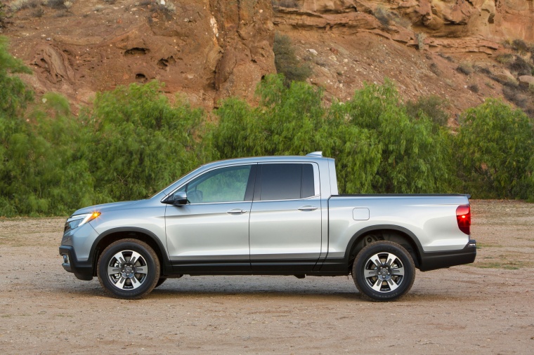Picture of a 2018 Honda Ridgeline AWD in Lunar Silver Metallic from a side perspective