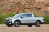 Picture of a 2018 Honda Ridgeline AWD in Lunar Silver Metallic from a front left three-quarter perspective
