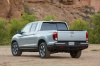 Picture of a 2018 Honda Ridgeline AWD in Lunar Silver Metallic from a rear left perspective