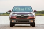 Picture of a 2018 Honda Ridgeline AWD in Deep Scarlet Pearl from a frontal perspective