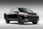Picture of a 2018 Honda Ridgeline Black Edition AWD in Crystal Black Pearl from a front right perspective