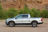 Picture of a 2019 Honda Ridgeline AWD in Lunar Silver Metallic from a side perspective