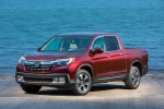 Picture of a 2019 Honda Ridgeline AWD in Deep Scarlet Pearl from a front left perspective