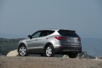 Picture of a 2014 Hyundai Santa Fe Sport in Moonstone Silver from a rear left three-quarter perspective