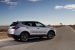 Picture of a 2015 Hyundai Santa Fe Sport in Sparkling Silver from a rear right three-quarter perspective