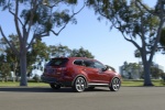 Picture of a 2016 Hyundai Santa Fe in Regal Red Pearl from a rear right three-quarter perspective