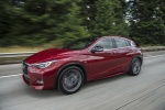 Picture of a driving 2018 Infiniti QX30S in Magnetic Red from a front left three-quarter perspective