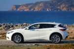 Picture of a 2018 Infiniti QX30 in Majestic White from a side perspective