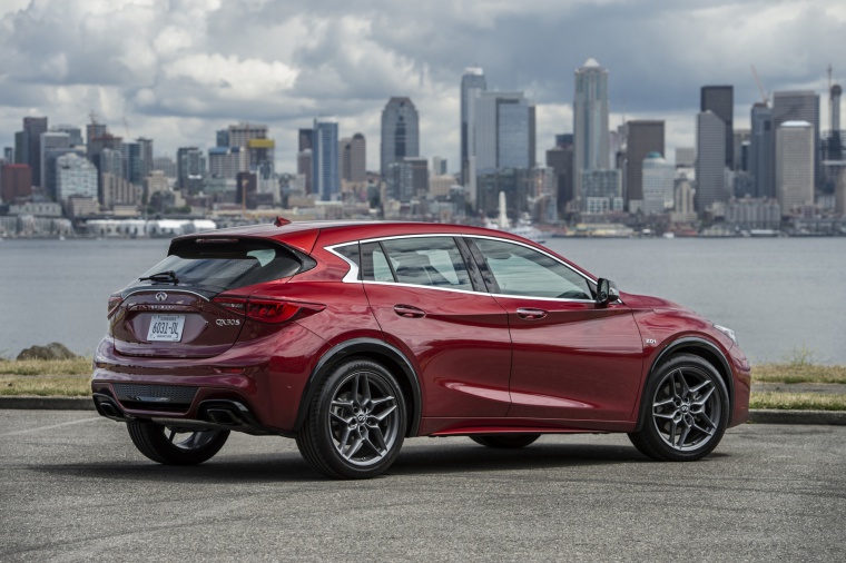 Picture of a 2019 Infiniti QX30S in Magnetic Red from a rear right three-quarter perspective