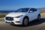 Picture of a driving 2019 Infiniti QX30 in Majestic White from a front left perspective