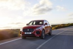 Picture of a driving 2018 Jaguar E-Pace P300 R-Dynamic AWD in Firenze Red Metallic from a front left perspective
