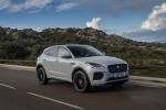 Picture of a driving 2018 Jaguar E-Pace P300 R-Dynamic AWD in Fuji White from a front right three-quarter perspective