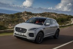 Picture of a driving 2018 Jaguar E-Pace P300 R-Dynamic AWD in Fuji White from a front left three-quarter perspective