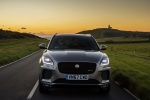 Picture of a driving 2018 Jaguar E-Pace P300 R-Dynamic AWD in Corris Gray from a frontal perspective