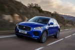 Picture of a driving 2018 Jaguar E-Pace P300 R-Dynamic AWD in Caesium Blue Metallic from a front left three-quarter perspective