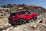 Picture of a 2017 Jeep Cherokee Trailhawk 4WD in Deep Cherry Red Crystal Pearlcoat from a rear right three-quarter perspective