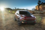 Picture of a 2017 Jeep Cherokee Trailhawk 4WD in Deep Cherry Red Crystal Pearlcoat from a front right perspective