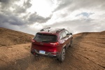 Picture of a 2017 Jeep Cherokee Trailhawk 4WD in Deep Cherry Red Crystal Pearlcoat from a rear right perspective