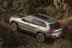 Picture of a 2017 Jeep Cherokee Trailhawk 4WD in Billet Silver Metallic Clearcoat from a rear left three-quarter perspective