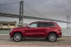 Picture of a 2014 Jeep Grand Cherokee Summit 4WD in Deep Cherry Red Crystal Pearlcoat from a left side perspective