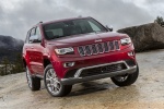 Picture of a 2014 Jeep Grand Cherokee Summit 4WD in Deep Cherry Red Crystal Pearlcoat from a front right perspective