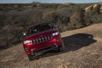Picture of a 2014 Jeep Grand Cherokee Summit 4WD in Deep Cherry Red Crystal Pearlcoat from a frontal perspective