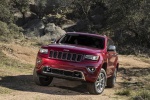 Picture of a 2014 Jeep Grand Cherokee Summit 4WD in Deep Cherry Red Crystal Pearlcoat from a front left perspective