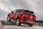 Picture of a 2014 Jeep Grand Cherokee Summit 4WD in Deep Cherry Red Crystal Pearlcoat from a rear left perspective