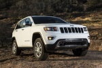Picture of a 2014 Jeep Grand Cherokee Limited 4WD in Bright White Clearcoat from a front right perspective