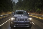 Picture of a driving 2014 Jeep Grand Cherokee Limited Diesel 4WD in Granite Crystal Metallic Clearcoat from a frontal perspective